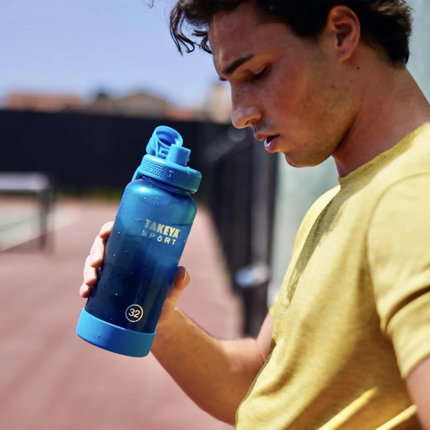 Takeya Tritan Sport Water Bottle with Spout Lid - BPA-Free & Dishwasher-Safe Water Bottle - Reusable Bottle with Lid Handle - Simple Leak-Proof Water Bottle - 32 oz, Pro Fire